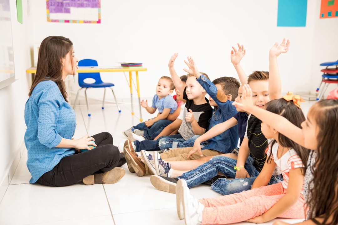 kindergarten teacher with kids